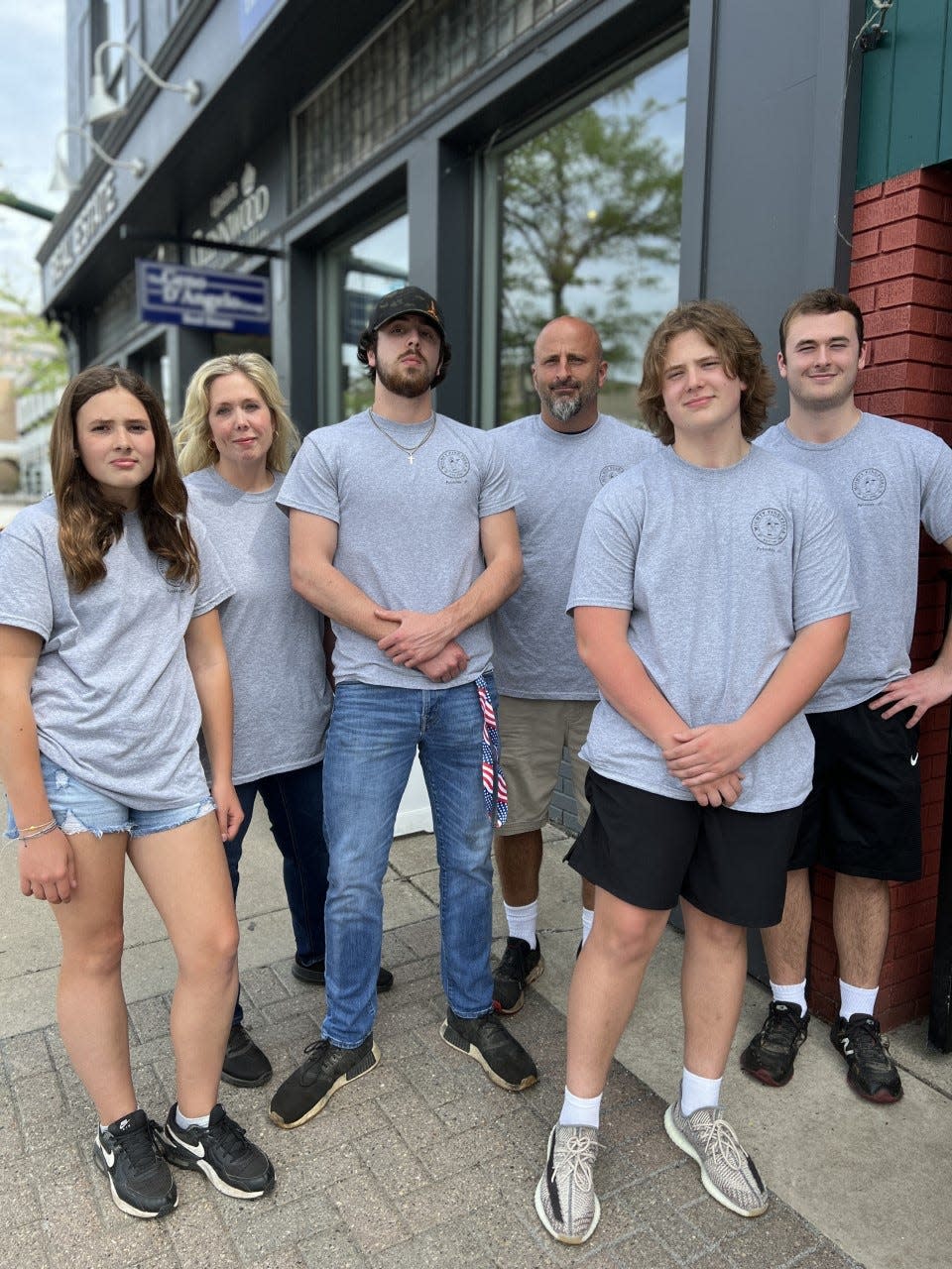 The Flynn family is celebrating 10 years of owning Mighty Fine Pizza at 222 E. Mitchell St. in Petoskey. Pictured (from left) are Lily Flynn, Ambre Flynn, Riley Flynn, Earl Flynn, Bradley Flynn and Garrett Flynn.