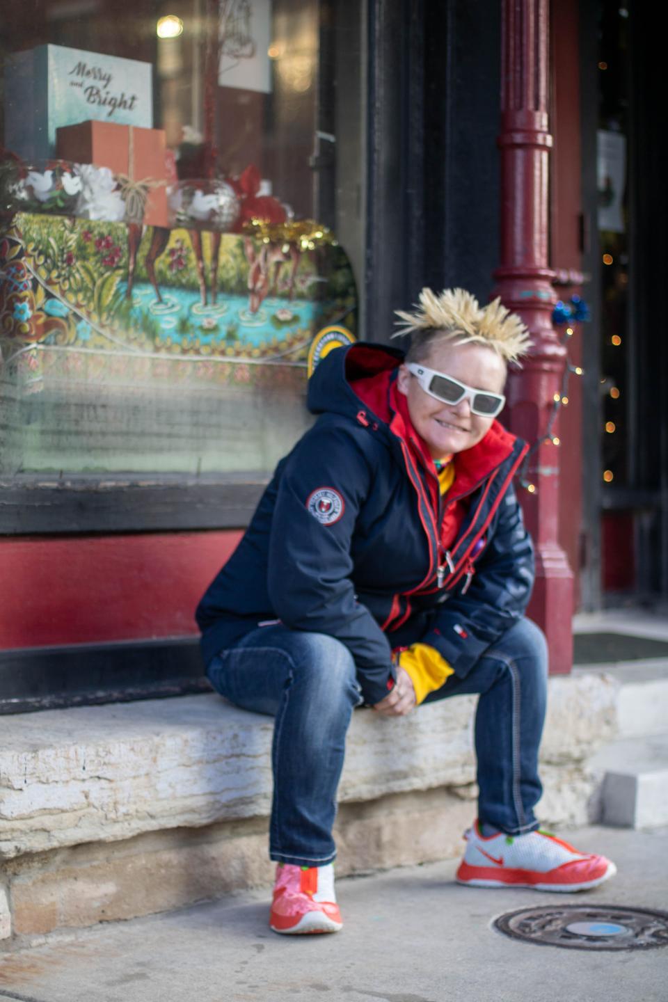 Dawn Baldwin poses for a portrait outside of Blooms & Petals, which once had a bench she'd sit at all day, on Tuesday, Dec. 21, 2021, at 848 Main St., in Lafayette.