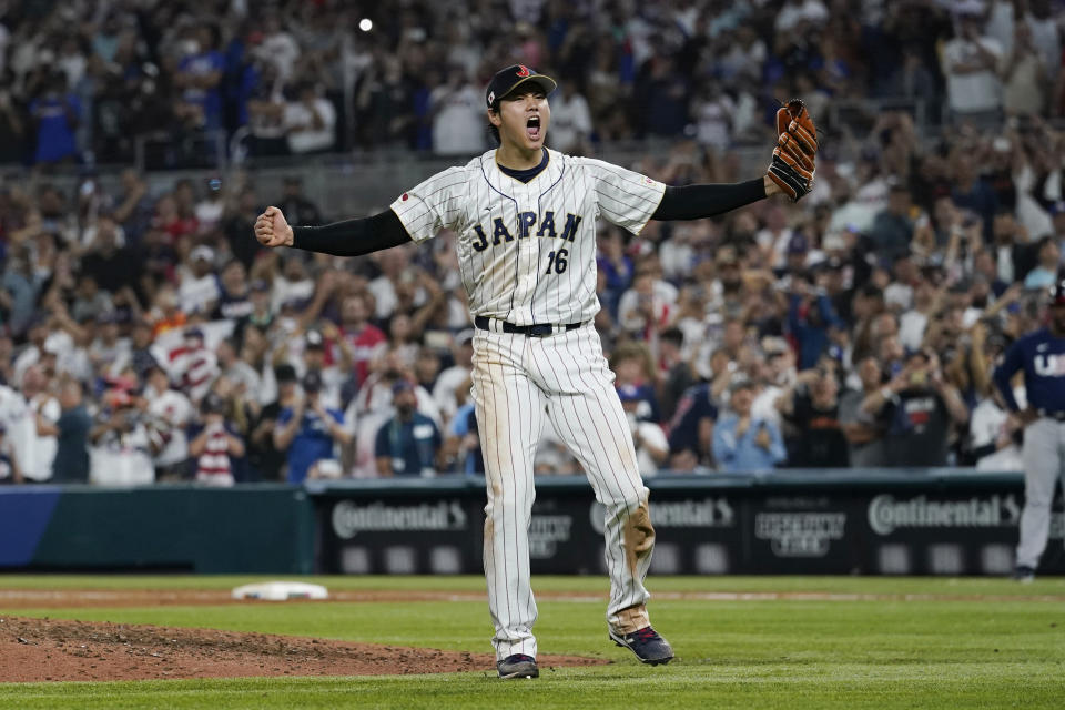 Japan pitcher Shohei Ohtani (16) celebrates after defeating the United States at the World Baseball Classic final game, Tuesday, March 21, 2023, in Miami. (AP Photo/Marta Lavandier)