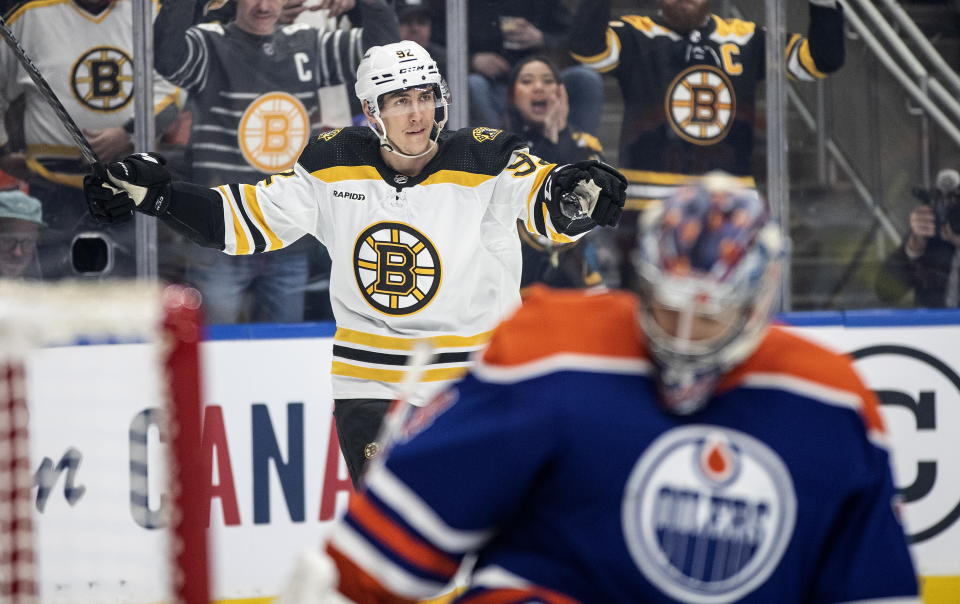 Boston Bruins' Tomas Nosek (92) celebrates after a goal against the Edmonton Oilers during first-period NHL hockey game action in Edmonton, Alberta, Monday, Feb. 27, 2023. (Jason Franson/The Canadian Press via AP)