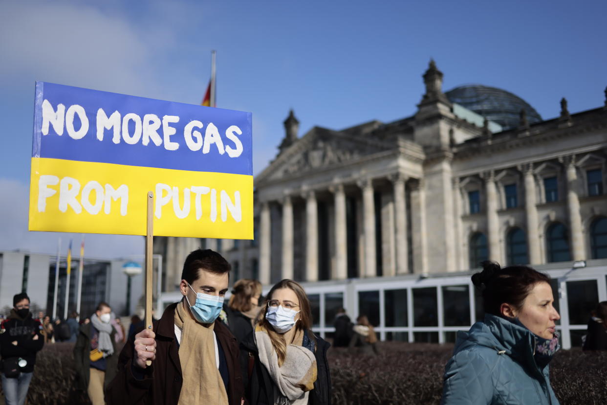 BERLIN, GERMANY - FEBRUARY 27: A man with a sign saying 