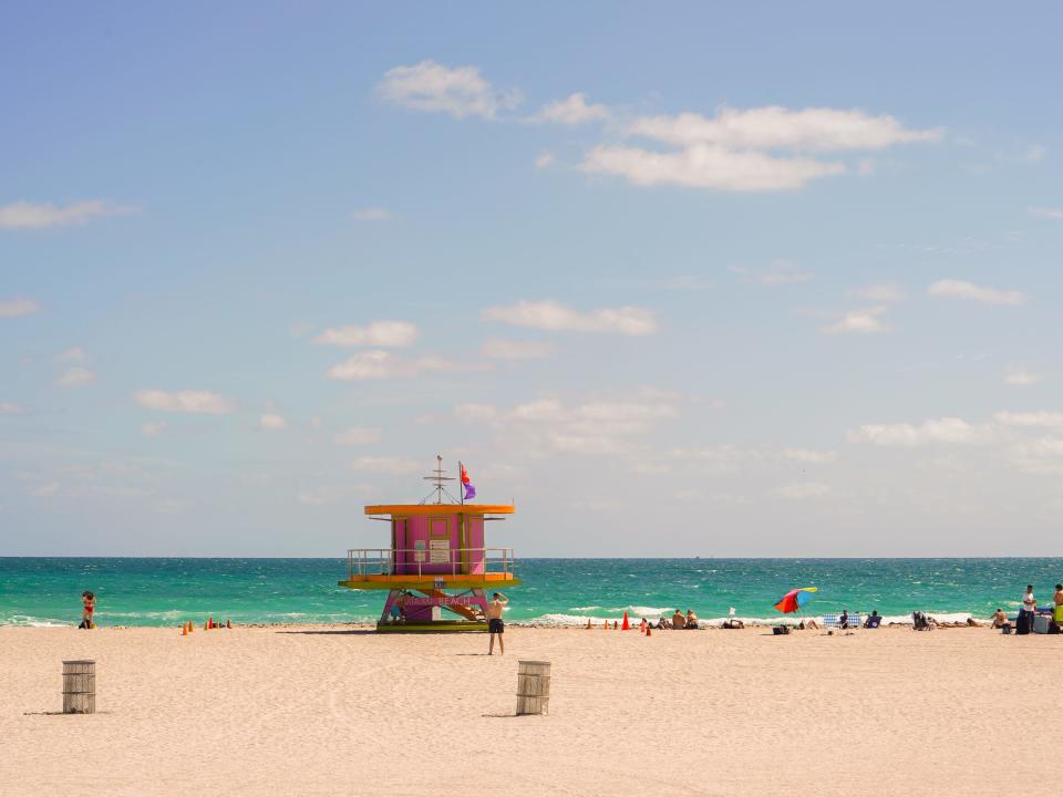 A beach scene in Miami on a partly cloudy day