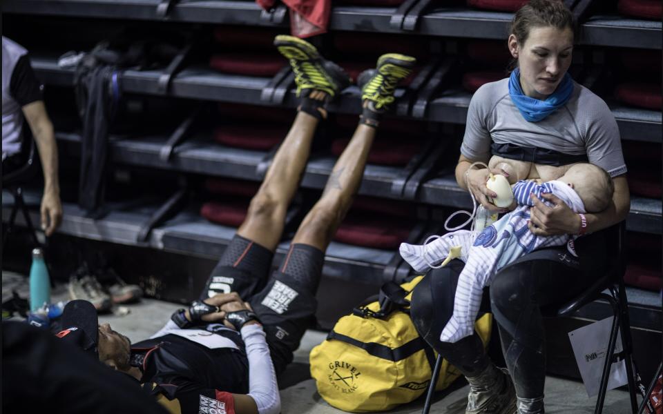 A photo of Sophie Power breastfeeding her three-month-old baby during an ultra-marathon race went viral last year - Alexis Berg/Strava