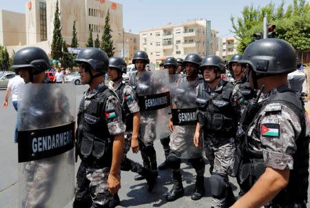 Jordanian police stand guard during a demonstration near the Israeli embassy in Amman, Jordan July 28, 2017. REUTERS/Muhammad Hamed