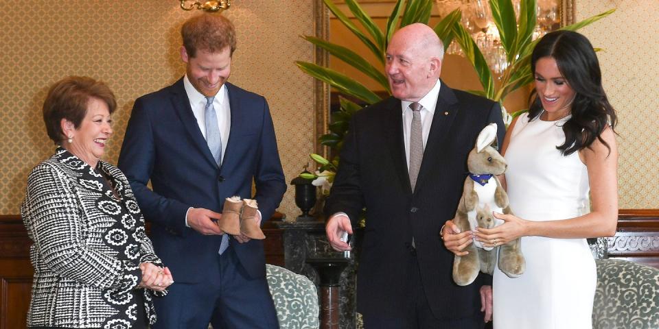 <p><strong>16 October</strong> The couple were greeted by Australia's Governor General Peter Cosgrove and wife Lynne Cosgrove, who gave them their first baby presents – a tiny pair of Ugg boots and a toy kangaroo.</p>