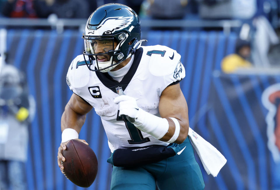 Dec 18, 2022; Chicago, Illinois, USA; Philadelphia Eagles quarterback Jalen Hurts (1) drops back to pass against the Chicago Bears during the second quarter at Soldier Field. Mandatory Credit: Mike Dinovo-USA TODAY Sports