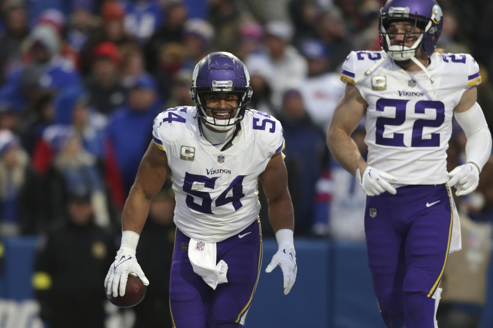 Minnesota Vikings linebacker Eric Kendricks (54) celebrates with safety Harrison Smith (22) after recovering a fumble in the end zone for a touchdown in the second half of an NFL football game against the Buffalo Bills, Sunday, Nov. 13, 2022, in Orchard Park, N.Y. (AP Photo/Joshua Bessex)