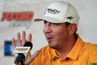 NASCAR Cup Series driver Kyle Busch answers questions at a news conference between series races and Cup qualifying at Pocono Raceway, Saturday, July 23, 2022 in Long Pond, Pa. (AP Photo/Matt Slocum)