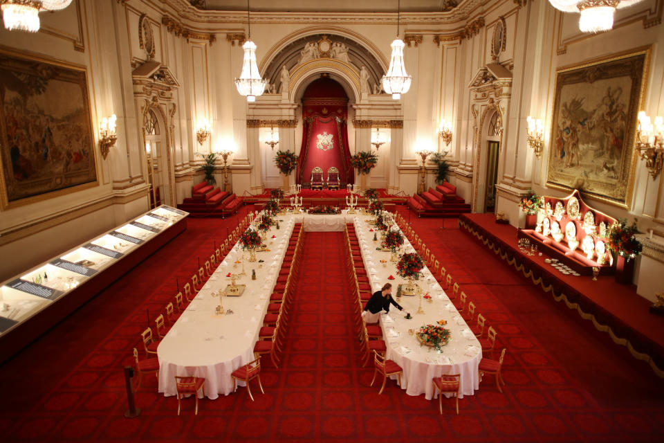 LONDON, ENGLAND - JULY 23: Table settings are laid out in the Palace Ballroom for a State Banquet at The Royal Welcome Summer opening exhibition at Buckingham Palace on July 23, 2015 in London, England. Last year the Royal Family welcomed around 62,000 guests to Buckingham Palace, at State Visits, receptions, Garden Parties, Investitures and private audiences. At the Summer Opening of the Palace, displays throughout the State Rooms have recreated the settings for some of these royal
occasions, and give an insight into what goes into creating a royal welcome, from the laying of a table at a State Banquet, to the creation of an outfit worn by Her MajestyThe Queen to receive visitors.  (Photo by Peter Macdiarmid/Getty Images)