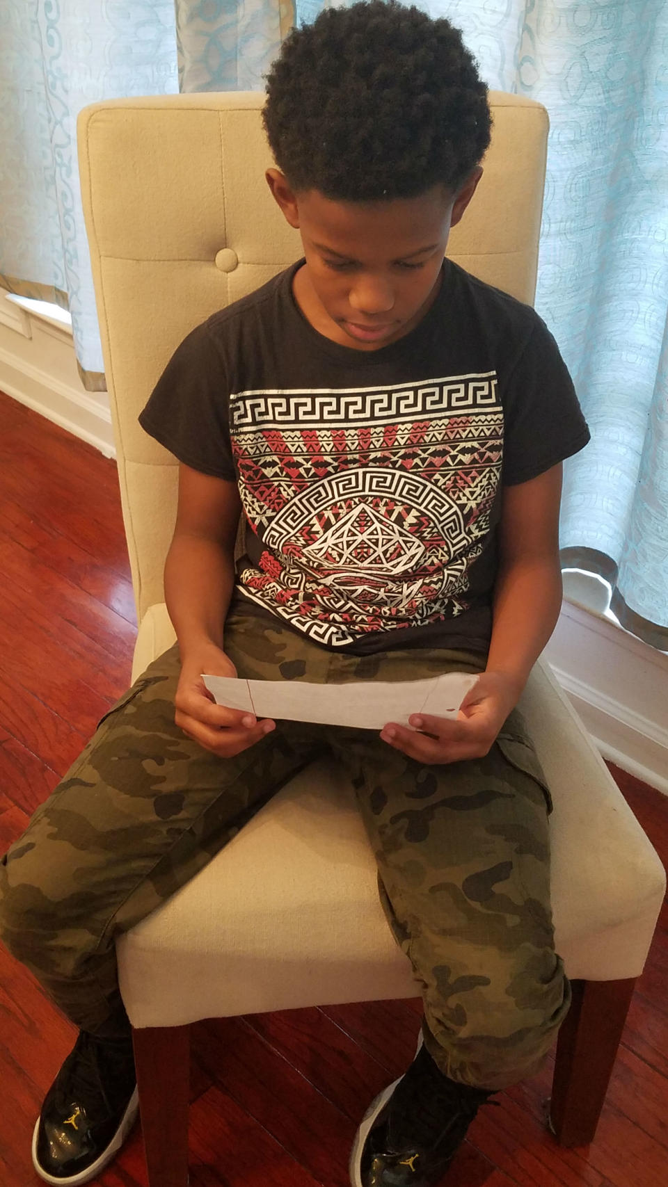 The boy’s mother “felt helpless” when her son read his letters to her. Source: Claudia Charles