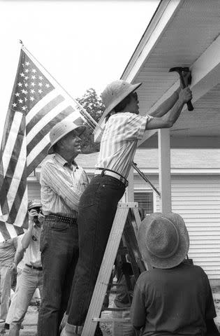 Habitat for Humanity International Rosalynn Carter wielding a hammer for the Carter Work Project in partnership with Habitat for Humanity