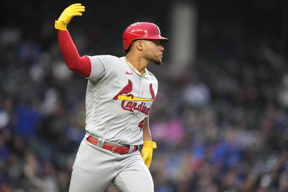 St. Louis Cardinals' Willson Contreras encourages the crowds boos and applause as he watches his hit off Chicago Cubs starting pitcher Marcus Stroman during the second inning of a baseball game on Monday, May 8, 2023, in Chicago. (AP Photo/Charles Rex Arbogast)