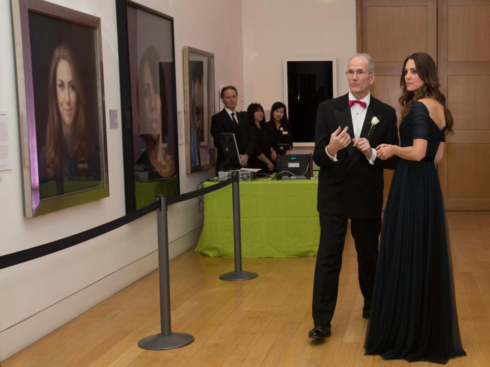 Kate Middleton looks at her portrait at the National Portrait Gallery.