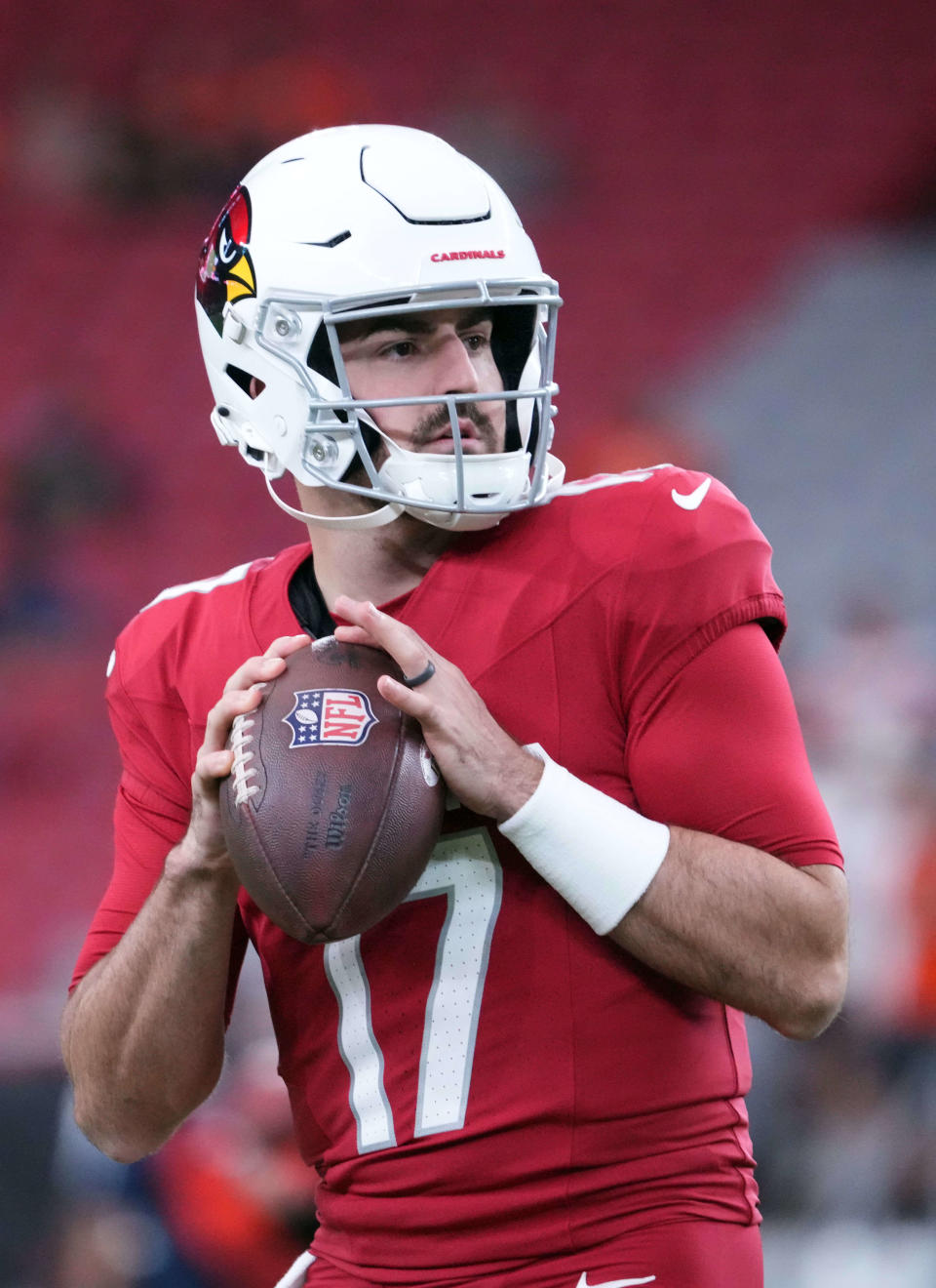 Arizona Cardinals quarterback David Blough (17) warms up prior to facing the Denver Broncos at State Farm Stadium in Glendale on Aug. 11, 2023