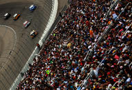 LAS VEGAS, NV - MARCH 11: Denny Hamlin, driver of the #11 FedEx Freight Toyota, leads a group of cars during the NASCAR Sprint Cup Series Kobalt Tools 400 at Las Vegas Motor Speedway on March 11, 2012 in Las Vegas, Nevada. (Photo by Ronald Martinez/Getty Images for NASCAR)