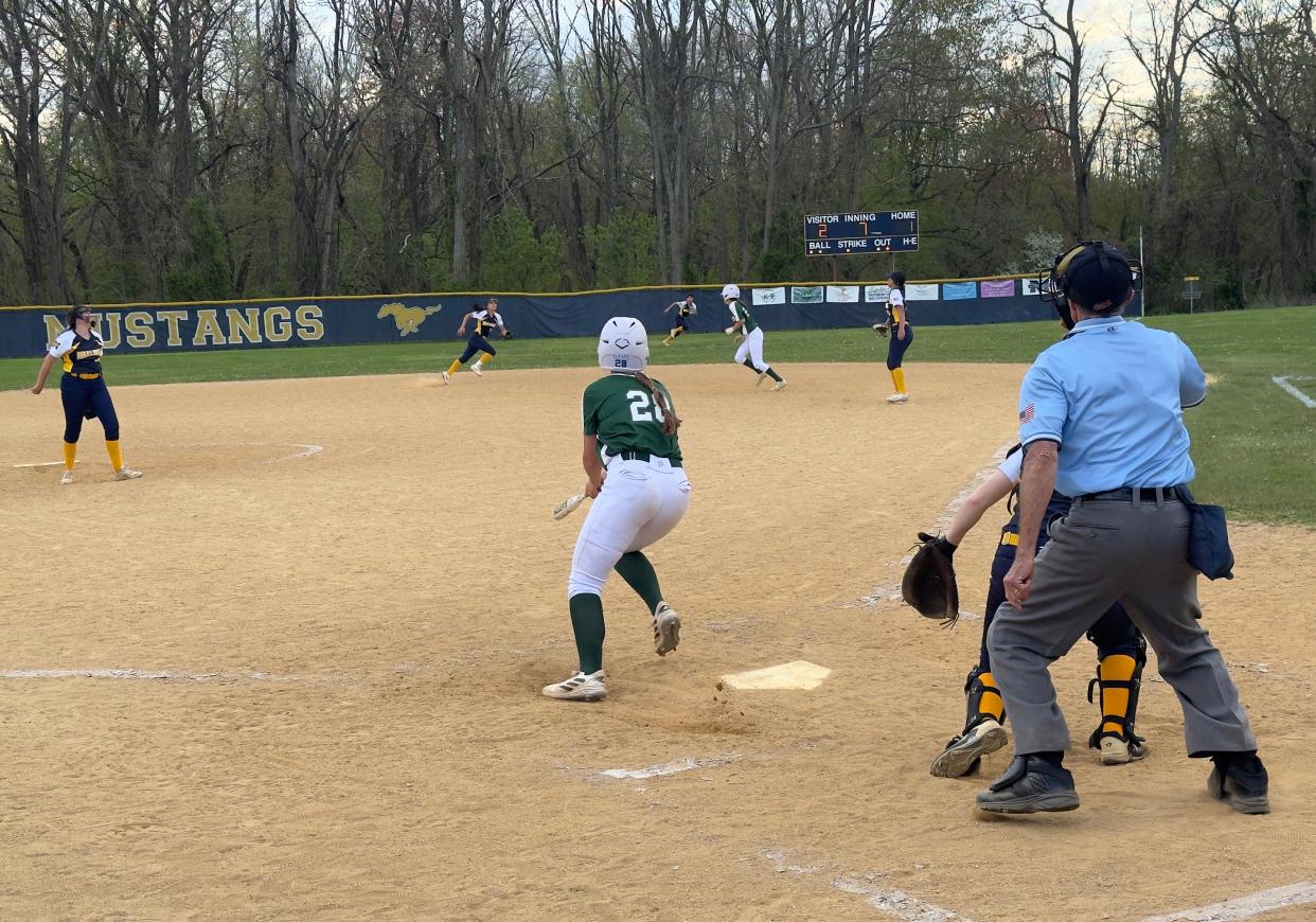 Angela Sasso hits a line drive into right field that was miraculously caught by Marlboro's Isabella Pitarresi.