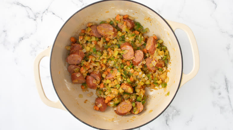 sausage and vegetables in pot