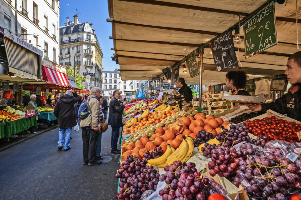 A farmers market with lots of fresh produce