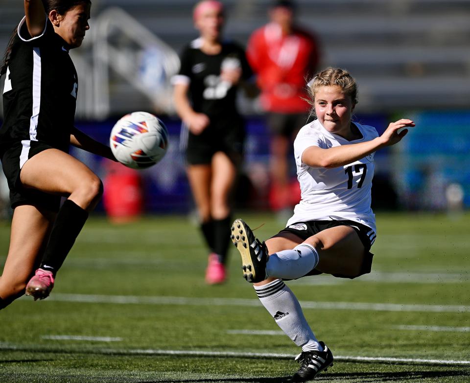 Park City’s Caroline Retzer goes for a shot with Stansbury’s Sofia Munoz defending as they play in 4A soccer playoff action at Zions Bank Stadium in Herriman on Monday, Oct. 16, 2023. Park City won 2-1 in overtime. | Scott G Winterton, Deseret News