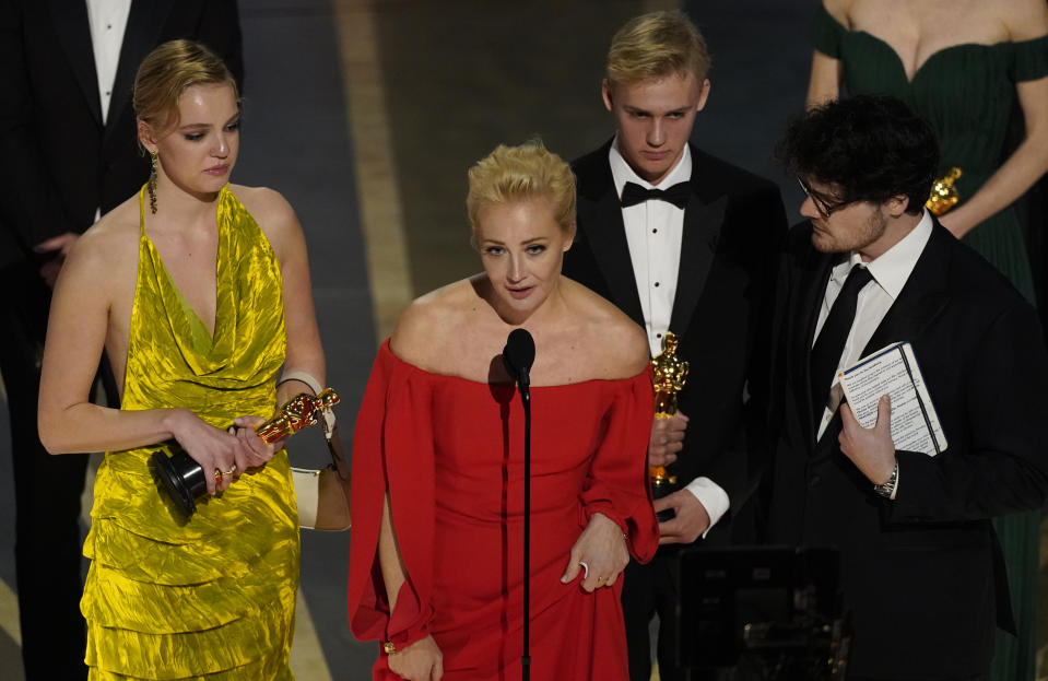 Yulia Abrosimova, second from left, and members of the crew from "Navalny" accept the award for best documentary feature film at the Oscars on Sunday, March 12, 2023, at the Dolby Theatre in Los Angeles. (AP Photo/Chris Pizzello)