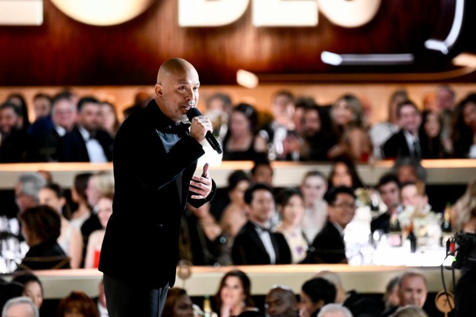 Jo Koy in action hosting the Golden Globes. Jimmy Kimmel thinks Koy should be given another shot at hosting the annual awards show. Golden Globes 2024 via Getty Images