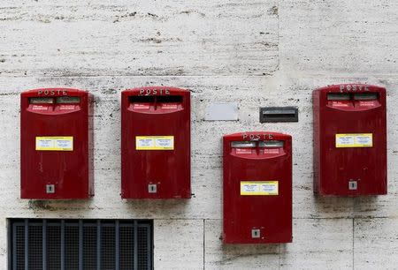 Mailboxes are seen in central Rome October 9, 2015. Italy's Treasury set a price range for the initial public offering of the post office that values it at up to 9.8 billion euros ($11 bln), in what will be the country's biggest privatisation in a decade. REUTERS/Alessandro Bianchi