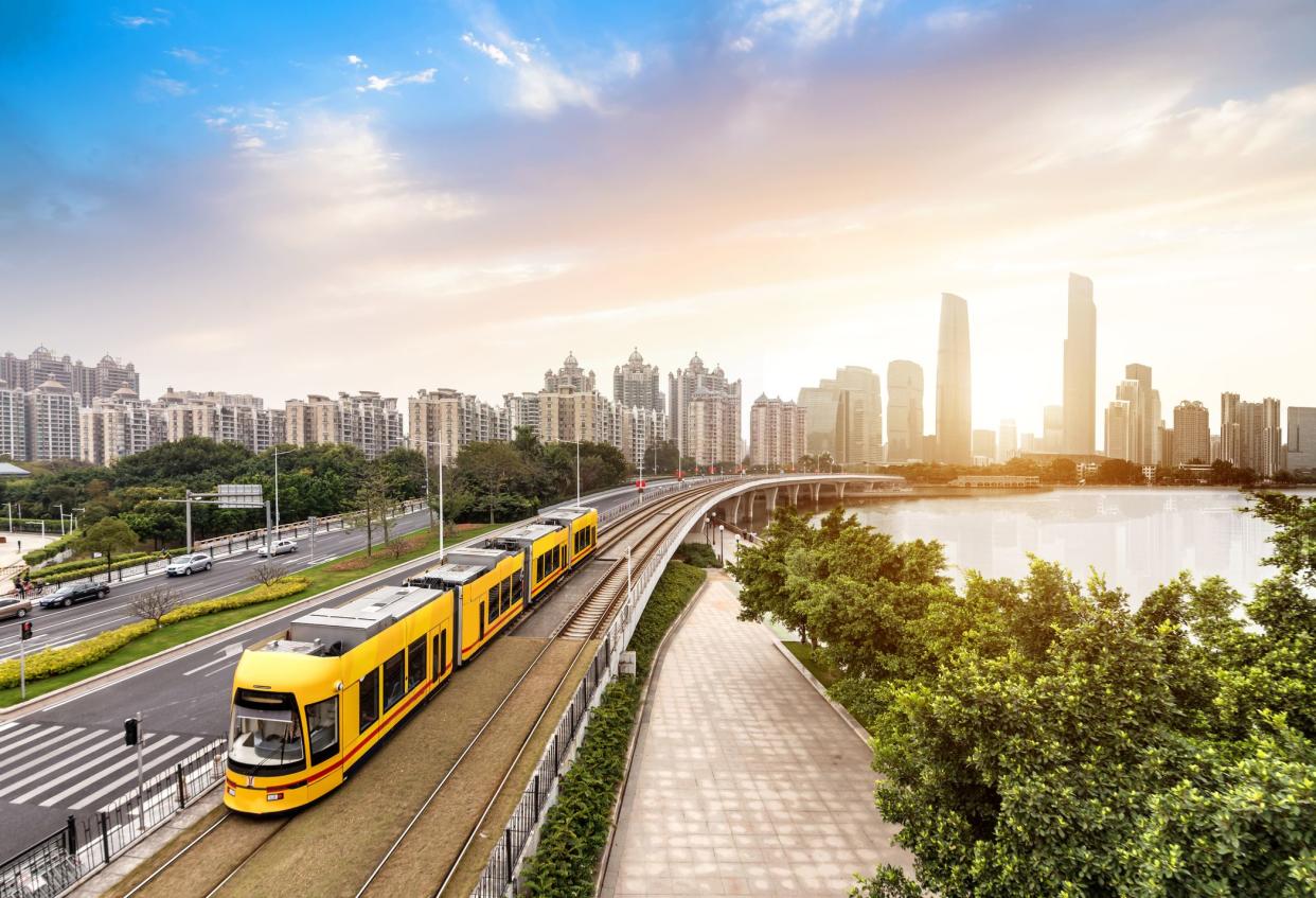 The sightseeing train is driving in the city,guangzhou,china