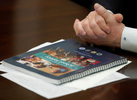 U.S. President Donald Trump attends a roundtable discussion of the Federal Commission on School Safety Report at the White House in Washington, U.S., December 18, 2018. REUTERS/Jim Young