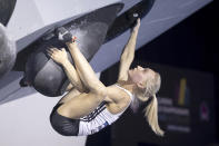 FILE - Slovenia's Janja Garnbret competes in the women's Boulder and Lead final at the IFSC Climbing World Championship 2023, at the PostFinance Arena, in Bern, Switzerland, Friday, Aug. 11, 2023. (Anthony Anex/Keystone via AP, File)