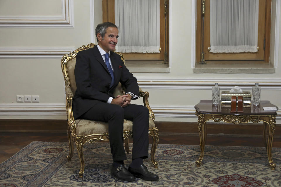 Head of the International Atomic Energy Agency, IAEA, Rafael Mariano Grossi, sits during his meeting with Iranian Foreign Minister Hossein Amirabdollahian in Tehran, Iran, Tuesday, Nov. 23, 2021. Grossi met Tuesday with Iranian officials to press for greater access in the Islamic Republic ahead of diplomatic talks restarting over Tehran's tattered nuclear deal with world powers. (AP Photo/Vahid Salemi)