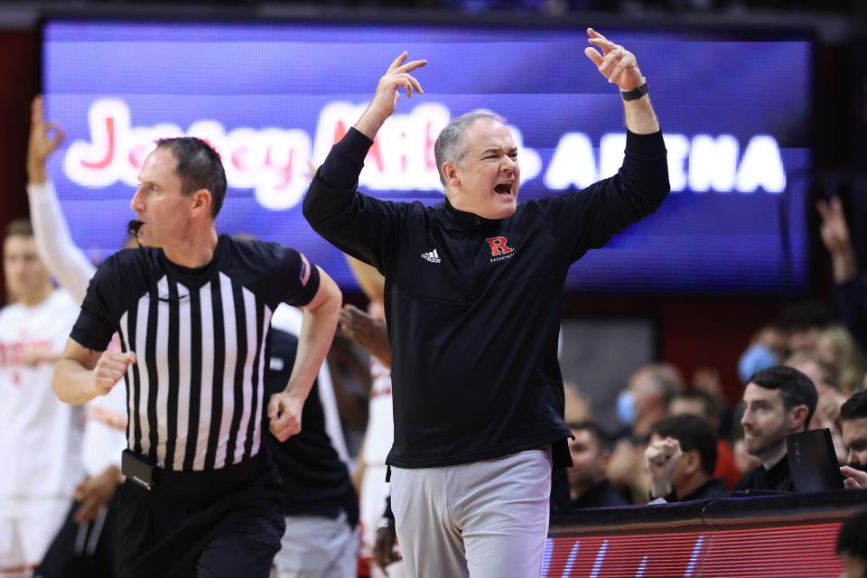 Rutgers Scarlet Knights head coach Steve Pikiell exhorts the crowd at Jersey Mike's Arena.