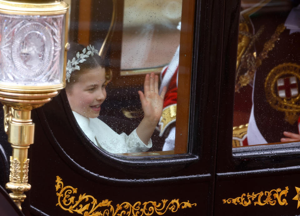 <p>LONDON, ENGLAND - MAY 06: Britain's Princess Charlotte waves following the coronation ceremony of Britain's King Charles and Queen Camilla, along The Mall on May 6, 2023 in London, England. The Coronation of Charles III and his wife, Camilla, as King and Queen of the United Kingdom of Great Britain and Northern Ireland, and the other Commonwealth realms takes place at Westminster Abbey today. Charles acceded to the throne on 8 September 2022, upon the death of his mother, Elizabeth II. (Photo by Paul Childs - WPA Pool/Getty Images)</p> 