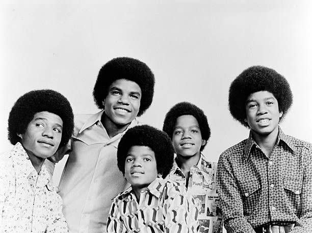 <p>Long before Michael Jackson was a worldwide sensation, he and his brothers attained an amazing degree of fame as kids. Raised in Gary, Indiana, the five brothers, ranging in age from 17 to 10, offered a wholesome family group with upbeat pop music—much different from a lot of the folksy songs that were currently in favor. Pushed by their musician father, The Jackson Five first played nightclubs, eventually catching the eye of producer Berry Gordy, Junior. They rocketed to fame in 1970, with their first four singles hitting the top of the charts: <a href="https://www.amazon.com/I-Want-You-Back/dp/B001NCUPG8/?tag=syn-yahoo-20&ascsubtag=%5Bartid%7C10063.g.35225069%5Bsrc%7Cyahoo-us" rel="nofollow noopener" target="_blank" data-ylk="slk:"I Want You Back";elm:context_link;itc:0;sec:content-canvas" class="link ">"I Want You Back"</a>, <a href="https://www.amazon.com/ABC/dp/B001NCKTRS/?tag=syn-yahoo-20&ascsubtag=%5Bartid%7C10063.g.35225069%5Bsrc%7Cyahoo-us" rel="nofollow noopener" target="_blank" data-ylk="slk:"ABC";elm:context_link;itc:0;sec:content-canvas" class="link ">"ABC"</a>, <a href="https://www.amazon.com/The-Love-You-Save/dp/B001NCMLPG/?tag=syn-yahoo-20&ascsubtag=%5Bartid%7C10063.g.35225069%5Bsrc%7Cyahoo-us" rel="nofollow noopener" target="_blank" data-ylk="slk:"The Love You Save";elm:context_link;itc:0;sec:content-canvas" class="link ">"The Love You Save"</a> and <a href="https://www.amazon.com/Ill-Be-There/dp/B001NCRBG0/?tag=syn-yahoo-20&ascsubtag=%5Bartid%7C10063.g.35225069%5Bsrc%7Cyahoo-us" rel="nofollow noopener" target="_blank" data-ylk="slk:"I’ll Be There";elm:context_link;itc:0;sec:content-canvas" class="link ">"I’ll Be There"</a>. Over the next two years, seven more singles would hit the top 25.</p>