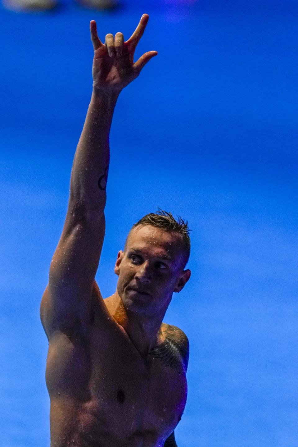 Caeleb Dressel reacts after winning the Men's 100 butterfly finals Saturday, June 22, 2024, at the US Swimming Olympic Trials in Indianapolis. (AP Photo/Darron Cummings)