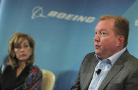 Stan Deal, president and CEO of Boeing Commercial Airplanes, right, talks as Leanne Caret president and CEO of Boeing Defense, Space & Security looks on at the Boeing press conference a day ahead before Dubai Airshow in Dubai, United Arab Emirates, Saturday, Nov. 16, 2019. The senior Boeing executive says the company knows it has to re-earn the public’s trust as it works to win approval from U.S. regulators to get its grounded 737 Max jets flying again after crashes that killed 346 people.(AP Photo/Kamran Jebreili)