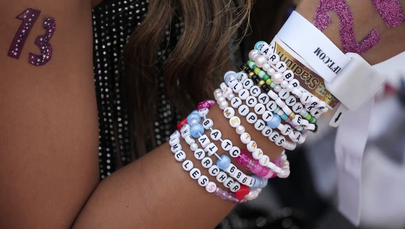 A Taylor Swift fan wears friendship bracelets before Swift’s performance on Aug. 7, 2023, at SoFi Stadium in Los Angeles.