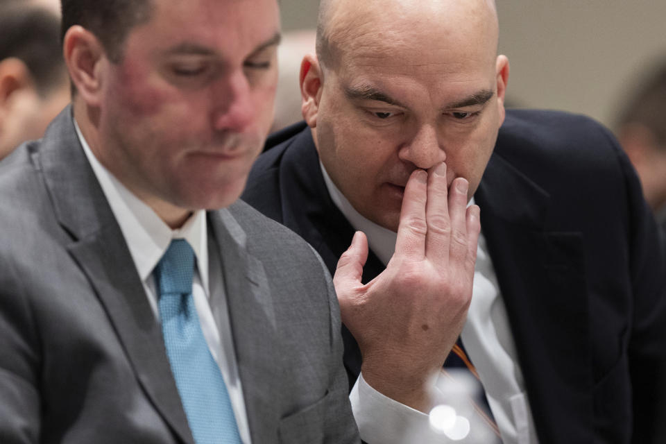 Prosecutor John Conrad speaks with David Fernandez during Alex Murdaugh's trial for murder at the Colleton County Courthouse on Tuesday, Jan. 31, 2023 in Walterboro, S.C. Murdaugh, 54, is standing trial on two counts of murder in the shootings of his 52-year-old wife and 22-year-old son. Murdaugh faces 30 years to life in prison if convicted. (Joshua Boucher/The State via AP, Pool)