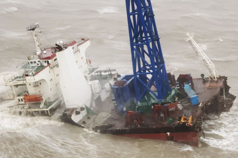 The Fujing 001 vessel sinks after snapping in two off the coast of Hong Kong on July 2, 2022. The engineering vessel with 30 crew members on board snapped in two as Typhoon Chaba hit Hong Kong. File Photo courtesy of Hong Kong GFS/EPA-EFE