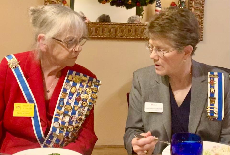 New Mexico Society Organization Daughters of the American Revolution  State Regent Patricia Barger, left, chats with Doña Ana NSDAR Chapter Regent Linda Bartlett, right.