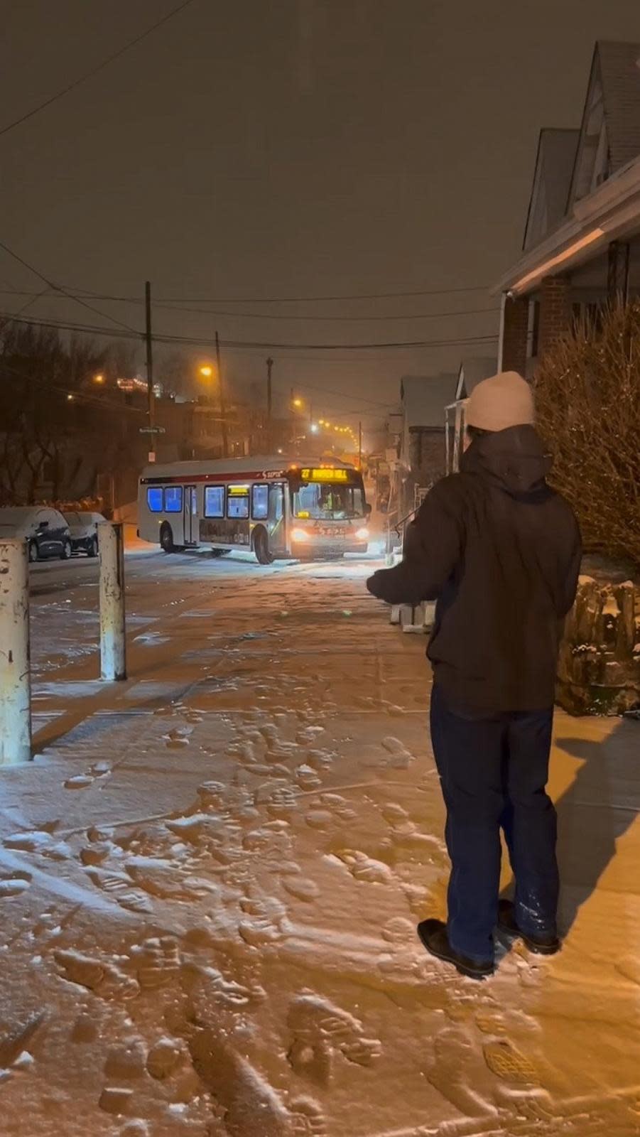 PHOTO: A SEPTA bus slides back down a hill in slick, snowy condition in Philadelphia, on Jan. 15, 2024. (Andrew Barczak)