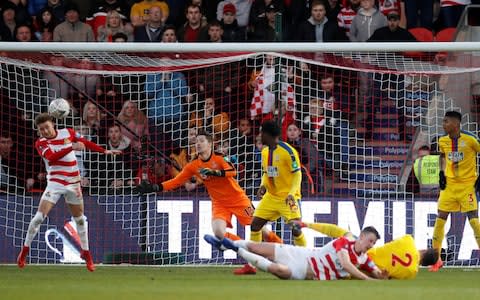 Doncaster Rovers' Alfie May misses a chance to score - Credit: REUTERS