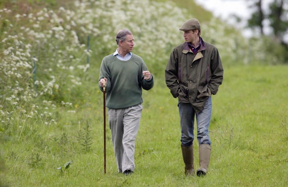 TETBURY, UNITED KINGDOM - MAY 29:  Prince William, In Countryman Outfit Of Tweed Cap And Waxed Jacket And With His Hands In His Pockets, Visits Duchy Home Farm With Prince Charles Who Is Holding A Shepherd's Crook Walking Stick  (Photo by Tim Graham Photo Library via Getty Images)