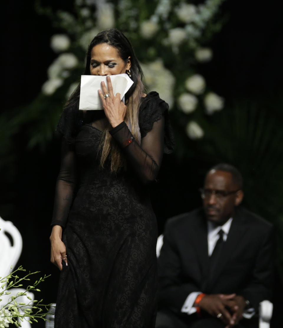 FILE - Muhammad Ali's daughter Rasheda Ali-Walsh walks off the stage after speaking during his memorial service in Louisville, Ky., in this Friday, June 10, 2016, file photo. Five years after his death, residents, as well as Ali’s daughter, Rasheda, look back at the legacy of the boxer and the ways the people of Louisville have come together since his passing. (AP Photo/David Goldman)