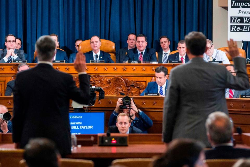 William Taylor and George Kent are sworn in ahead of their testimony in the impeachment hearings against Donald Trump: AFP/Getty