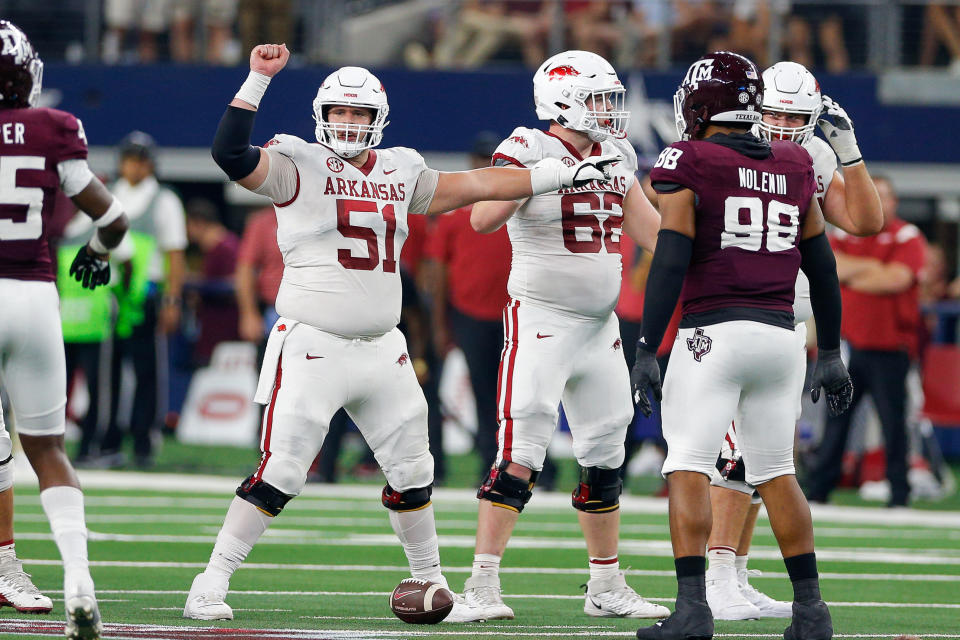 Sep 24, 2022; Arlington, Texas, USA; Arkansas Razorbacks offensive lineman Ricky Stromberg (51) signals during the second quarter against the Texas A&M Aggies at AT&T Stadium. Mandatory Credit: Andrew Dieb-USA TODAY Sports