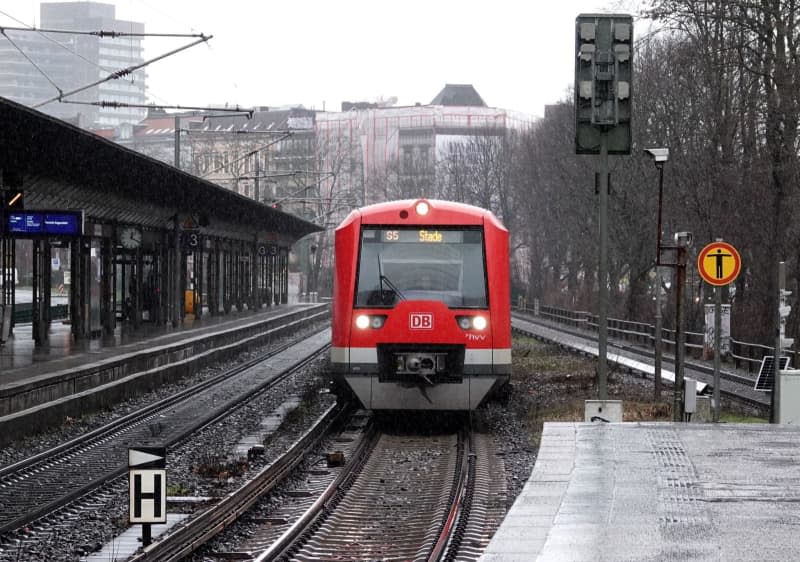 An S-Bahn train pulls into Dammtor station. Germany's urban and suburban trains, the S-Bahn network operated by state-owned Deutsche Bahn, ran less punctually last year than in previous years. Rabea Gruber/dpa
