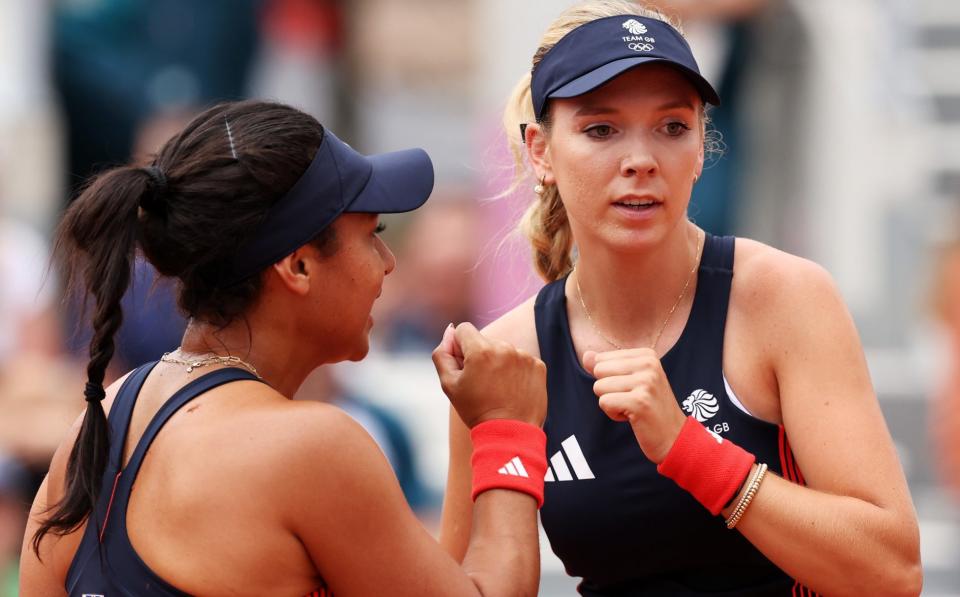 Katie Boulter celebrates with partner Heather Watson against Brazil's Beatriz Haddad Maia and Luisa Stefani