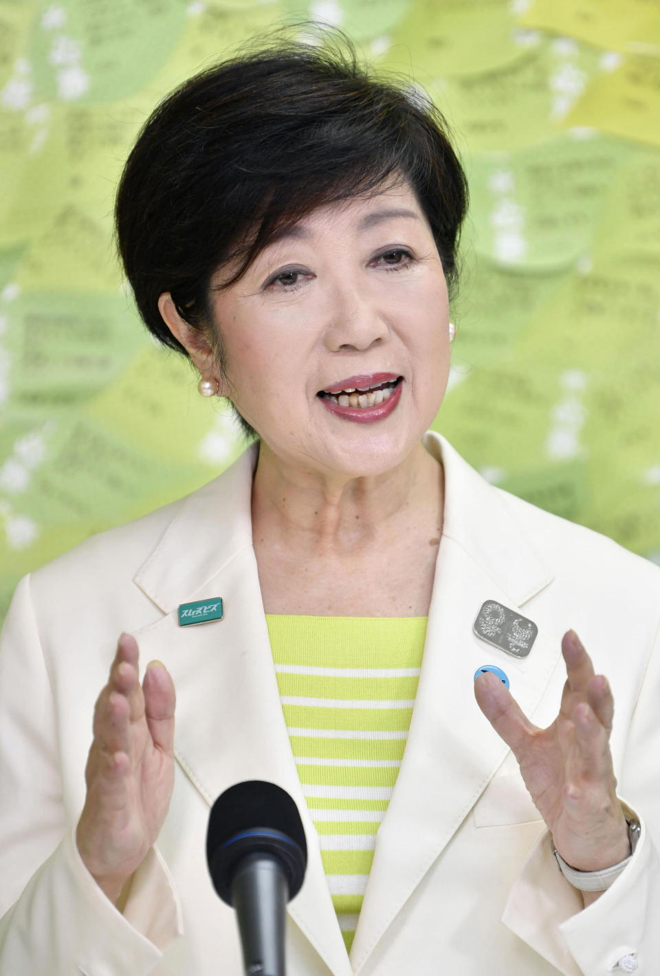 Tokyo Gov. Yuriko Koike speaks at a news conference after winning a second term to head the Japanese capital, in Tokyo Sunday, July 5, 2020. (Kyodo News via AP)