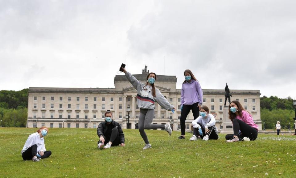 A group of friends meet up for the first time since the Covid-19 lockdown began, at Stormont on 19 May.