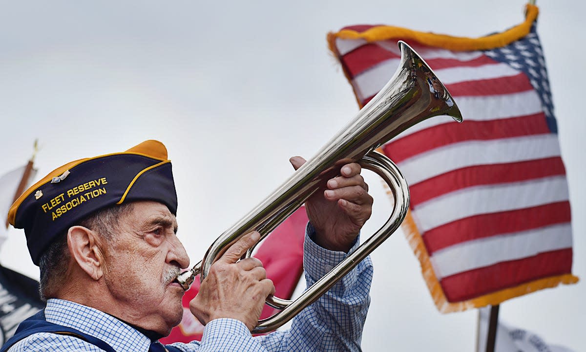 Veteran Larry Beirola plays Taps at a ceremony before the Fall River Veterans Day Parade in this Herald News file photo from 2022.